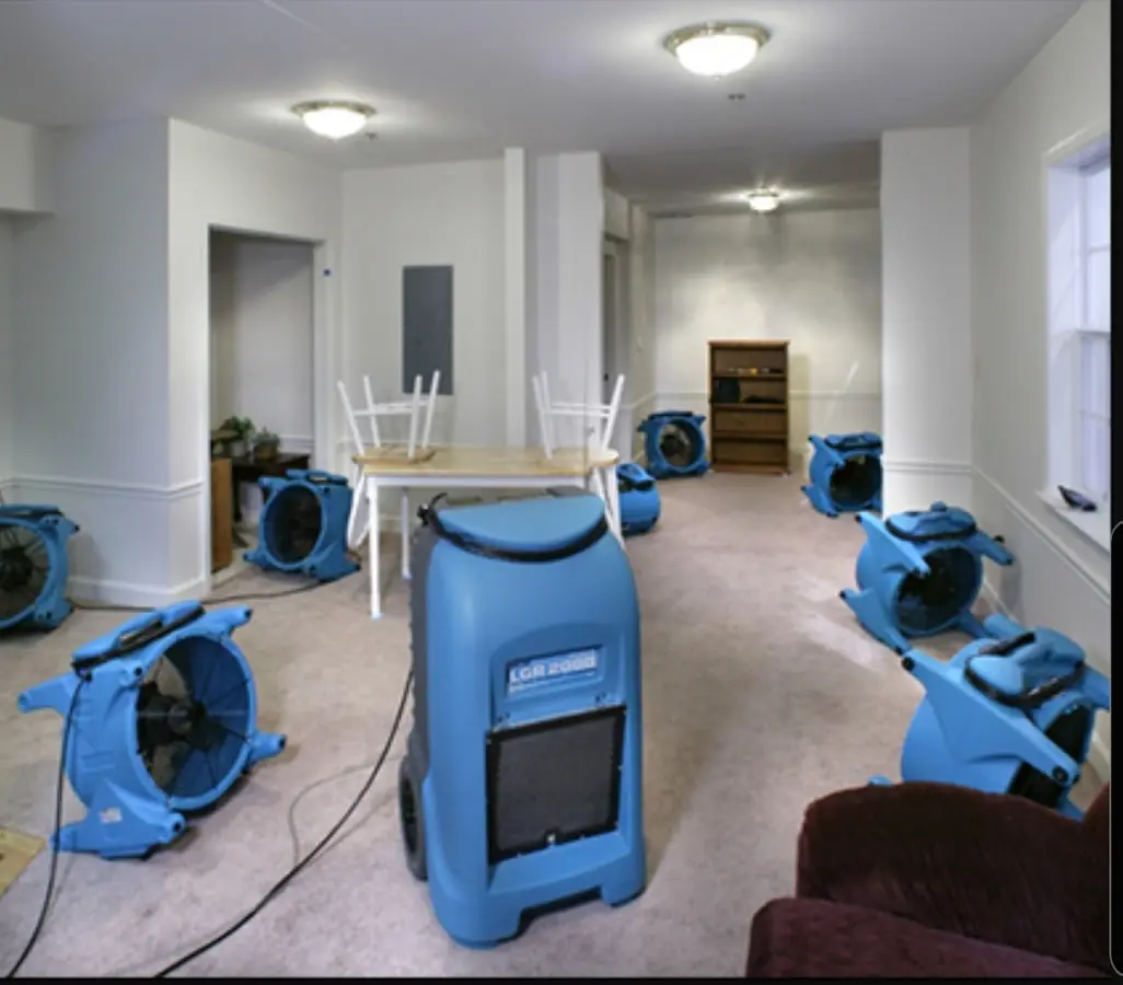 Air movers and dehumidifier setup for Water Damage Restoration in Linganore